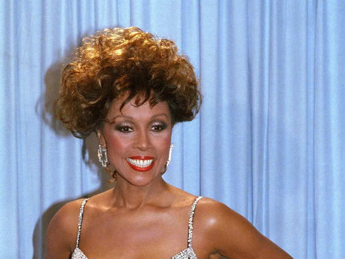 In 1985, Diahann Carroll of "Dynasty" wore a black dress with a silver jewel trim and straps.