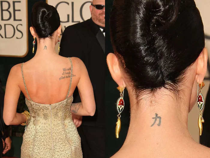 The Chinese symbol for "strength" is drawn on the back of her neck.