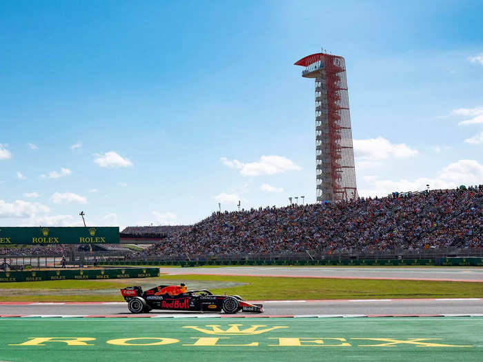 Red Bull driver Max Verstappen races in front of the iconic tower at the Circuit of the Americas in Austin, Texas.