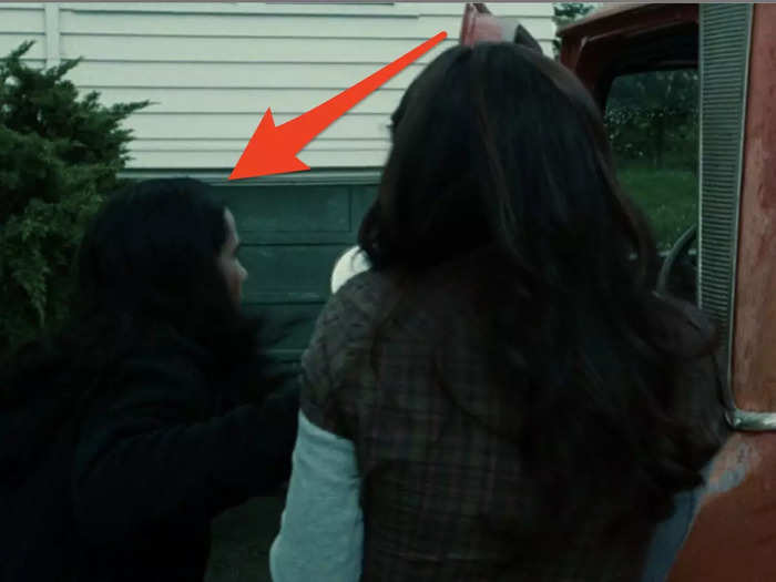 Bella hits Jacob with her truck's door.