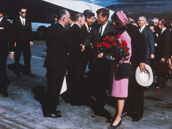 After her husband was assassinated in 1963, first lady Jackie Kennedy wore a blood-stained suit to "let them see what they've done."
