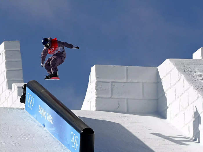 Coursemakers of the Beijing Olympic Games have carved out parts of the Great Wall for snowboarders to cruise by as they make their way down the slopes.