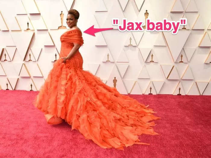 Aunjanue Ellis' fiery Versace dress paid tribute to her late mother, Jacqueline, with the words "Jax baby" embroidered on one shoulder.