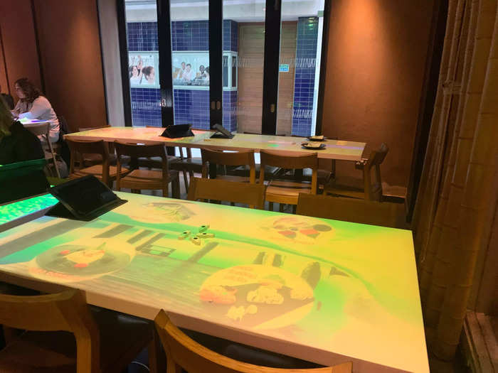 London boasts a chain of interactive restaurants serving Japanese, Chinese, Thai, and Korean food, where diners can play games, doodle, and set up a virtual tablecloth on the dining tables while waiting for their food.