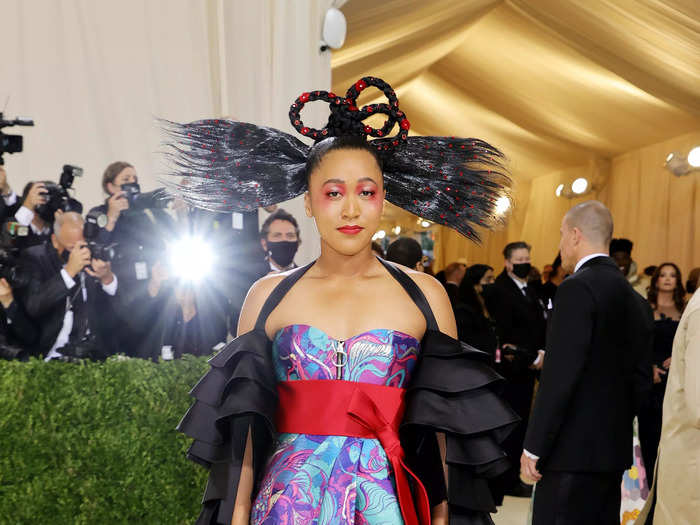 Naomi Osaka wore a corseted dress with a colorful koi-fish pattern in tribute to her Japanese heritage at the 2021 Met Gala.