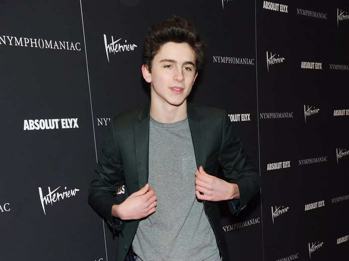 Chalamet attended a March 2014 screening in a simple gray T-shirt, black blazer, and  galaxy-printed pants.