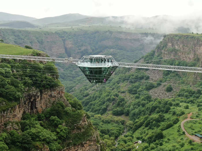 The next time you go out for drinks, you could test your limits and visit a bar suspended more than 900 feet above a canyon.