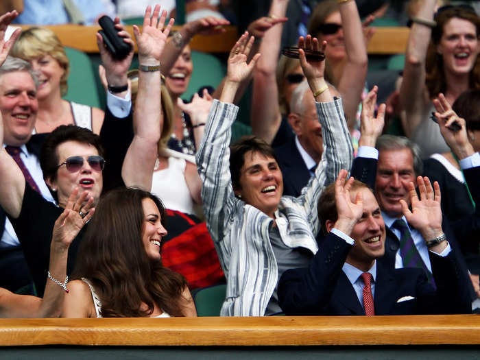 Kate Middleton couldn't seem to hold back a smile watching Prince William participate in a crowd wave at their first Wimbledon together in 2011.