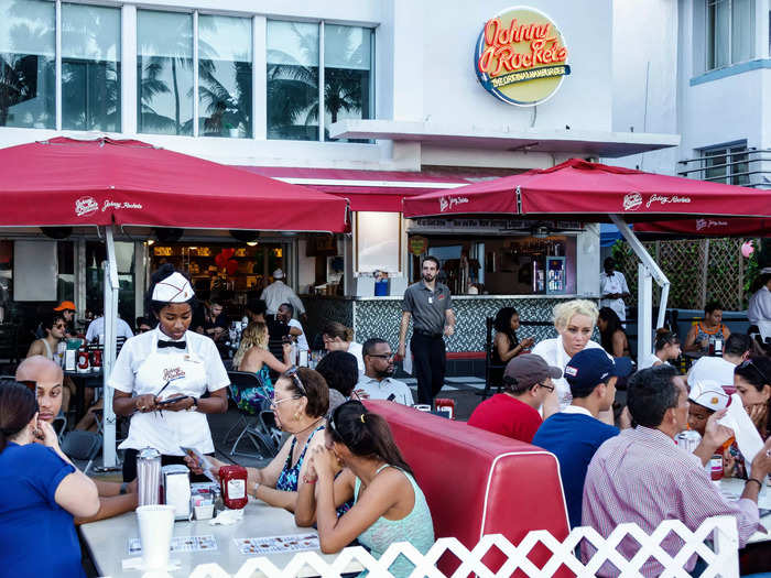 Johnny Rockets has been serving burgers, fries, and shakes since the 1980s, and the vibe inside is meant to resemble a 1950s diner, according to Mashed.