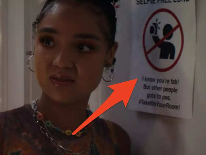 There's a "selfie-free zone" sign on the bathroom door at the graduation party.