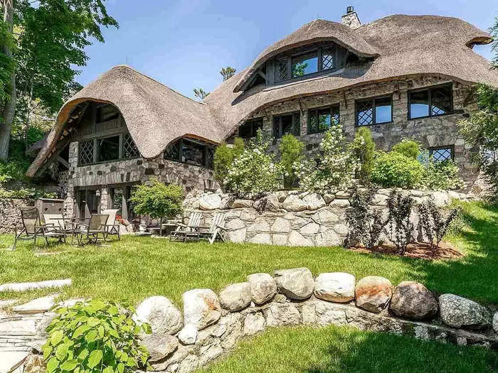 Michael Seitz spent three years renovating a 1918 stone cottage in Charlevoix, Michigan. Known as "The Thatch House" due to its roof, he's now listing the home for $4.5 million.