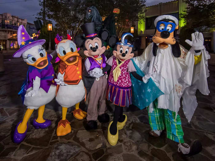 From September through October 31, Disneyland park-goers can meet their favorite characters with a Halloween twist: they're wearing spooky costumes.