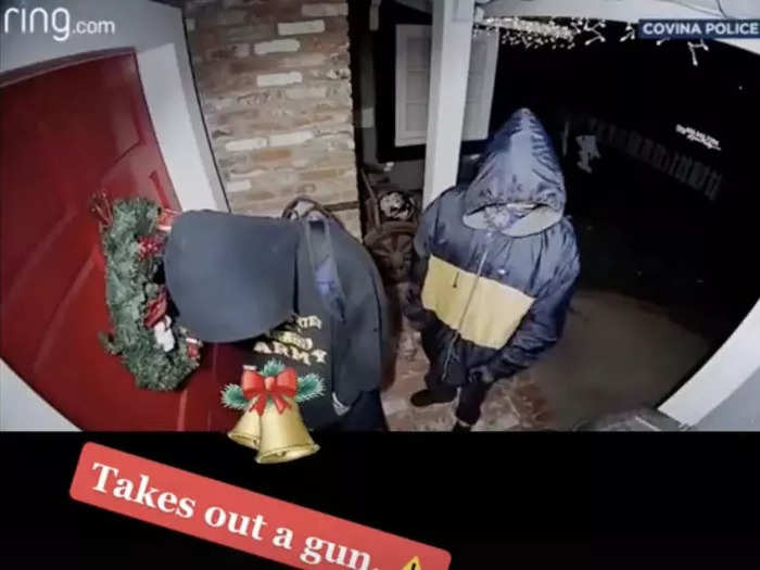 HORROR: Two hooded individuals attempt to gain access to a stranger's home while reportedly holding a gun.