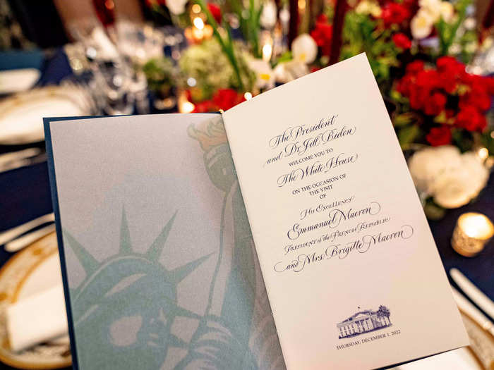 The dinner's theme features colors from both the American and French flags: red, white, and blue.